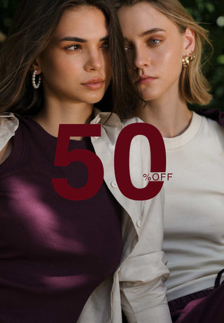 Two women standing close together with a '50% OFF' text overlay.