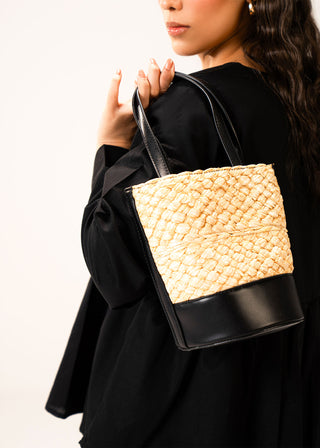 Bucket bag with braiding details