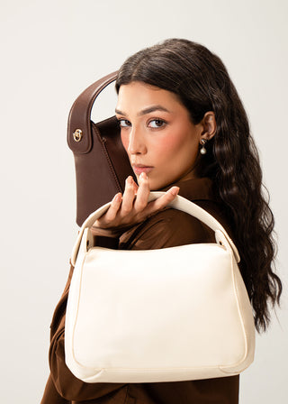 Top handle bag with magnetic closure