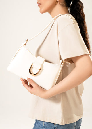 Mini shoulder bag with metallic clasp